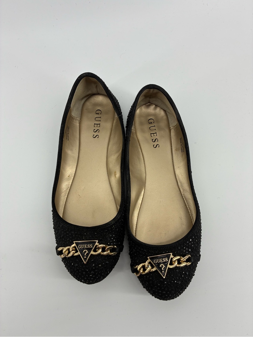 Guess Black Flats with Gold Chain Accent
